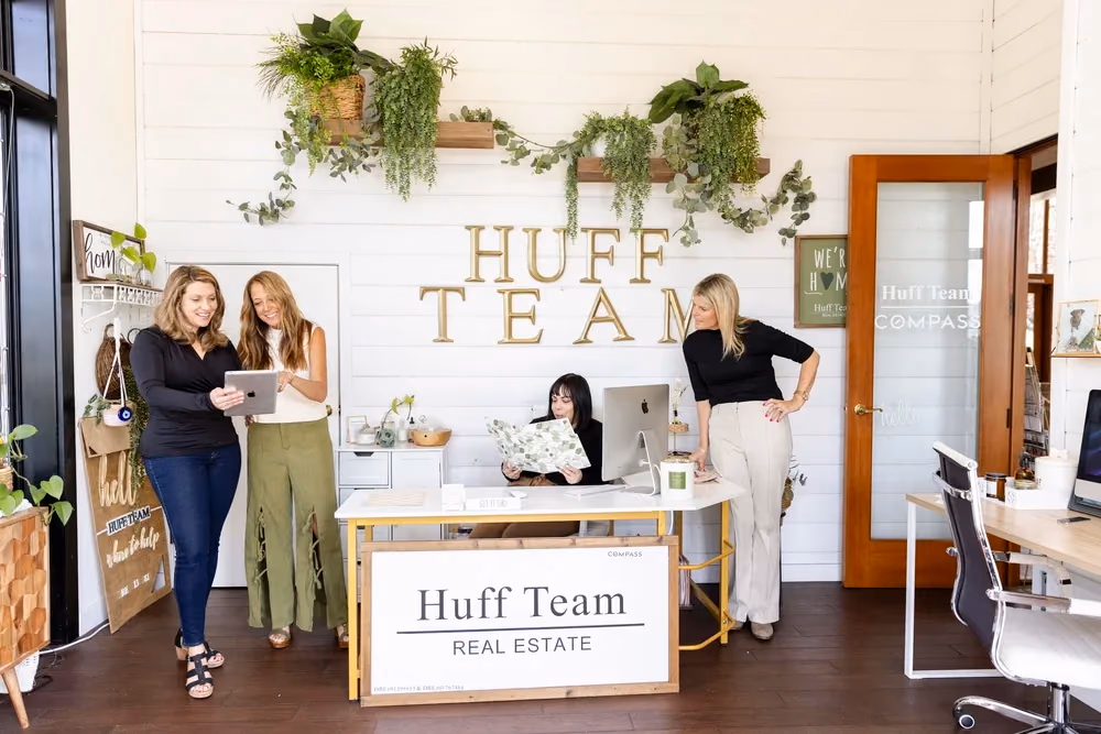 The Huff Team collaborating in their San Elijo Hills office