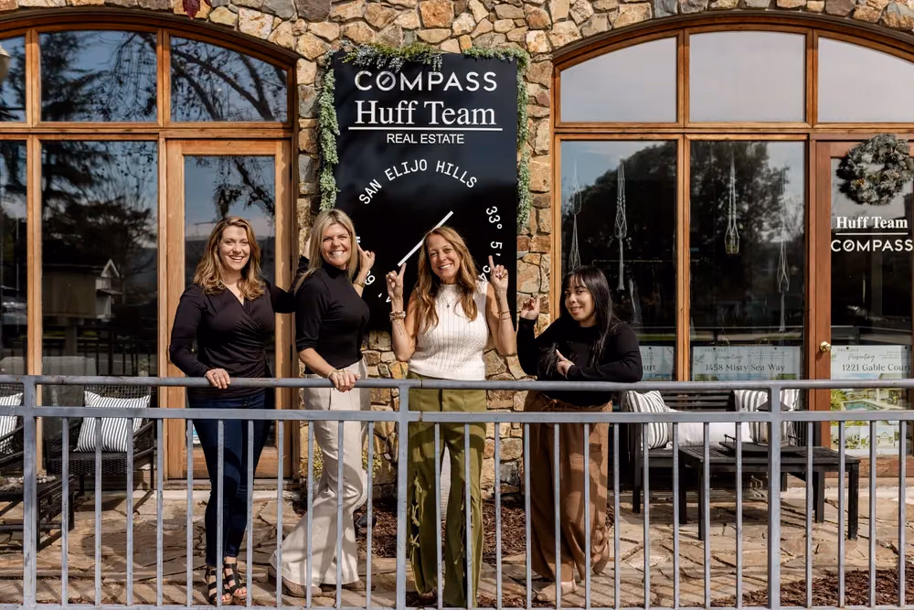 The Huff Team together outside their local office